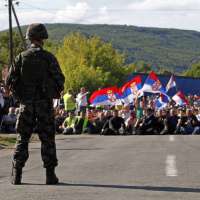 2011-07-29T200314Z_1698106432_GM1E77U0BFK01_RTRMADP_3_KOSOVO-BORDER-scaled-e1623263634316